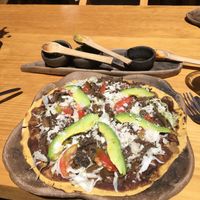 Tlayuda with mushrooms 110 pesos  at Hierba Dulce in Oaxaca