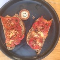 Tomato toast with hummus, sooo good! at Hierba Dulce in Oaxaca