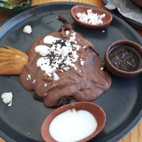 Chile relleno with beans, homemade vegan cheese and cream and hibiscus' kind-of jam. Very well balanced and delicious at Hierba Dulce in Oaxaca