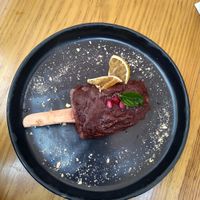 Paleta helada de fresa cubierta de chocolate at Hierba Dulce in Oaxaca