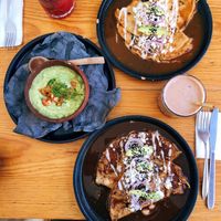 Great guacamole. Disappointing bland enfrijoladas and enchiladas.   Expensive.  at Hierba Dulce in Oaxaca