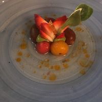 Tomato salad with strawberries, avocado, in chili oil at Cafe Des Artistes in Puerto Vallarta