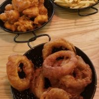 Spiced popcorn cauliflower, fries & onion rings ~ all very good. at Culture Burger Joint in Nelson