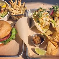 Cauliflower tacos, beyond burger, truffle fries, Cesar salad at Second Nature in San Diego