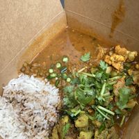 The vegan dishes of the day with rice .  at Gujarati Rasoi - Borough Market Food Stall in South East London