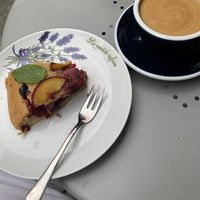 vegan cake & flat white at W Filizance Cafe in Poznan
