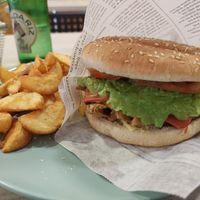 No-pollo burger (heura pb chickn sandwich) and potato wedgess at Veggie Burger in Vigo