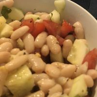 Ensalada de habichuelas, tomate, pepino y albahaca  at Veggie Burger in Vigo