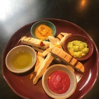 Pita with dippings  at Justo Restaurant in Medellin