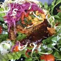 the bun-less vegan burger - patty made with mushrooms and tempeh. delicious. at Two Trees Eatery in Tibubeneng