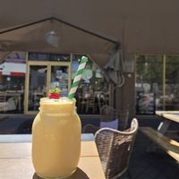 Mango smoothie with coconut yoghurt and oat milk at Cafe Chickpea in Horsham