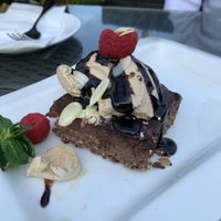 Vegan dessert - chocolate brownie with salted caramel happy cow ice cream  at Hemingway's By The Bay in Outlying Islands