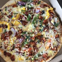 Vegan Chicken pizza was very good! It looks not good, but very good:)  at Hemingway's By The Bay in Outlying Islands