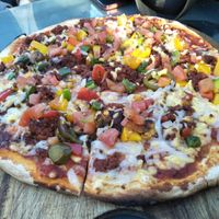 Chipotle pizza at Hemingway's By The Bay in Outlying Islands
