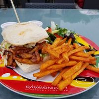 Fries and salad are good, but jack fruit sandwich not at Hemingway's By The Bay in Outlying Islands