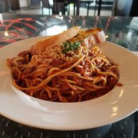 Spaghetti bolognese is excellent at Hemingway's By The Bay in Outlying Islands