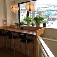 They have a cozy atmosphere and nice view of the street outside at Veggie House in Chiba