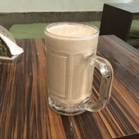 Oat milk, banana and peanut butter milkshake 👌🏻 at Ira's Kitchen & Tea Room in Rishikesh