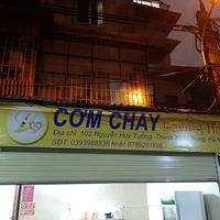 banner of the shop, in 102 alley at Loving Hut - Hoang Kim in Hanoi