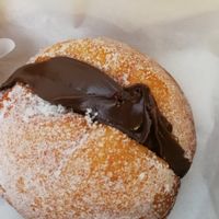 Bolo de Berlin filled with chocolate. Amazing at Zarzuela in Lisbon