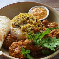 Lamb curry - a lot of side dishes included to accompany the yummy curry at Cafe Nowa in Petersham