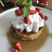 Vega. Pancakes w coconut whipped cream (the portion is actually a big, the plates are just huge)  at Crate Cafe in Canggu