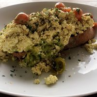 Generous portion of scrambled tofu, avocado and lots of tomatoes- so yum at Crate Cafe in Canggu