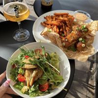Cesar salad with oumph, chilli glazed vegan wings with sweet potato fries  at Martens hus in Nykoping