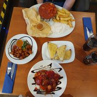 Breaded cauliflower, garlic bread, sweet & sour 'chicken' special and 'chicken' tikka curry at The Saltwater Inn in Porthcawl