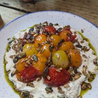 Confit tomatoes with almond ricotta at The Spread Eagle in East London