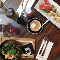 My Japanese girlfriend bowl and scrambled tofu with juice and oat latte  at Flax & Kale - Sant Pere Mes in Barcelona