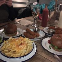 Tikki burgers, cheesy fries, moz sticks, leaves, kimchi balls... ALL DELICIOUS! at The Blacksmith & The Toffeemaker in London