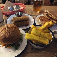 Tofish burger, polenta fries, mozzarella sticks, toastie  at The Blacksmith & The Toffeemaker in London