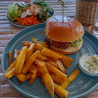 Lentil burger plus side salad at Aloha Cafe in Sesimbra