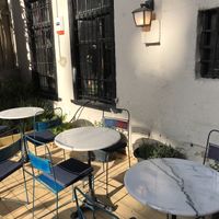 Outdoor seating at Meshek Barzilay Deli in Tel Aviv