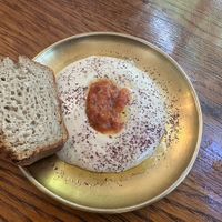 Starter - tahini with tomato.   at Meshek Barzilay Deli in Tel Aviv