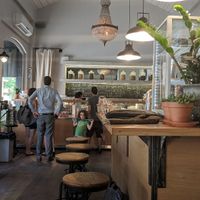 Looking at counter at Meshek Barzilay Deli in Tel Aviv