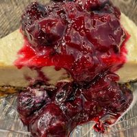 Cheesecake with cherry topping   at Planted in Hamilton in Hamilton