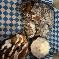 Apple fritter (our favorite!), cinnamon roll and carrot cake.   at Planted in Hamilton in Hamilton