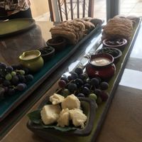 Breakfast bread and homemade “cheese” and plum jam  at Kami Suites Hotel in Safed