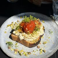 Brioche toast with almond ricotta and tomatoes   at Zaczyn in Krakow