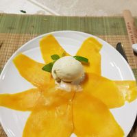 Mango with coconut ice cream at Hoa Nghiem in Hue