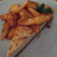 Vegan cheesecake with cardamon-fried apple pieces at Karls Kraut in Luzern