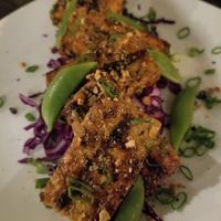 Korean BBQ tofu nuggets with red cabbage, crispy soybeans, and sugar snap peas at Cloud Red in Shorewood