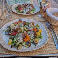 Main: falafel salad with white sauce and lots of veggies at La Part du Colibri in Crest