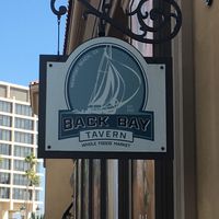 Sign by entrance at rear of store at Back Bay Tavern in Newport Beach