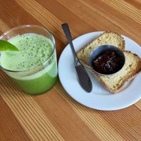 Green juice and gluten-free toast with fig jam. at Tiny Moreso in Portland