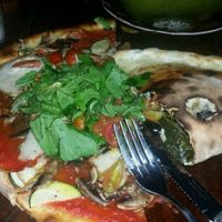 vegetariana with vegan cheese & vegan calzone shared at La Baracca in Canggu