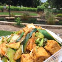 Tofu with mixed vegetables over rice. at Kow Lee Foods in Harare