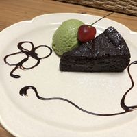 Delicious chocolate cake with matcha soy ice cream  at Grains in Nagoya